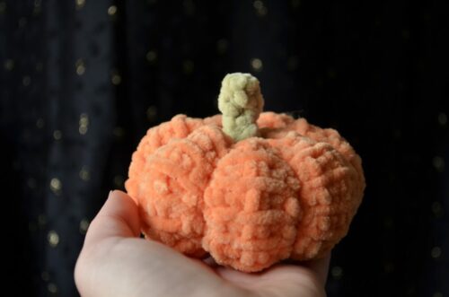 Small Tunisian crochet pumpkin made with chenille yarn