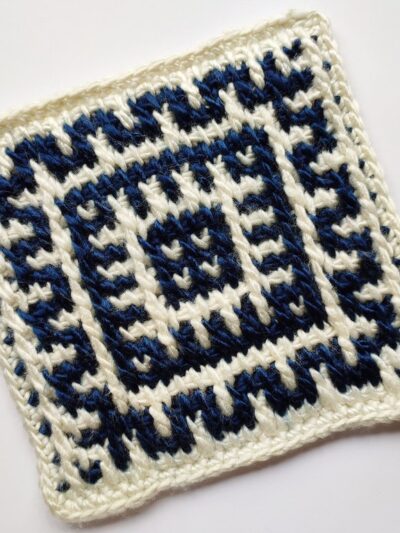 White and blue Tunisian crochet mosaic blanket square