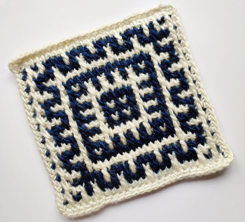 White and blue Tunisian crochet mosaic blanket square